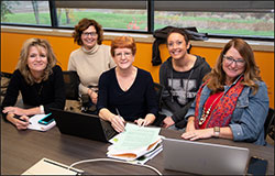 A group of teachers sitting